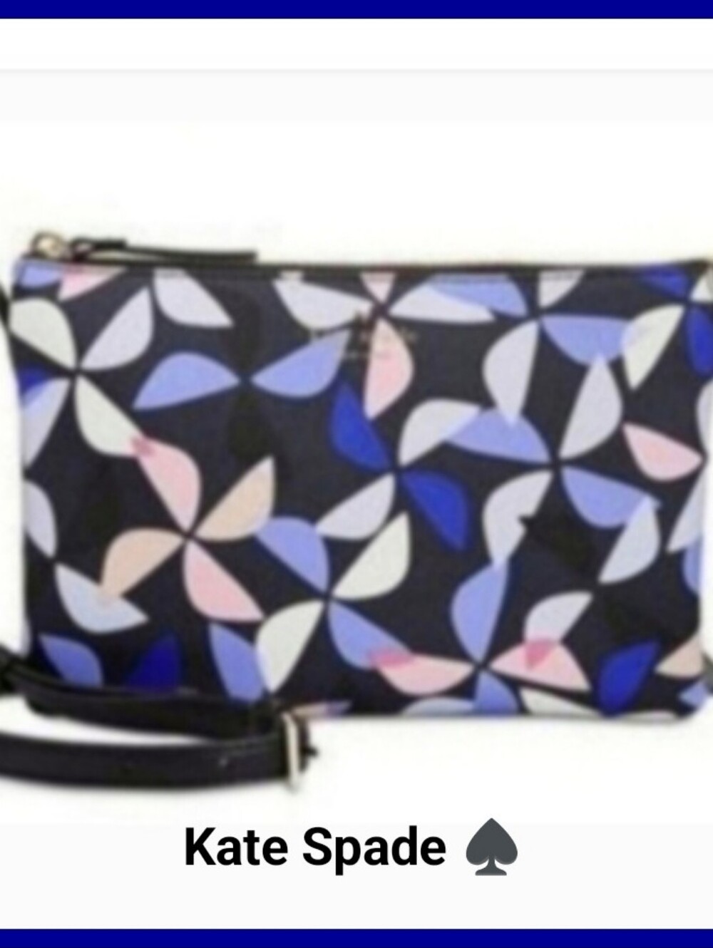 Kate Spade Hawthorne cross-body Carolyn spinner handbag. Navy with pink pinwheel